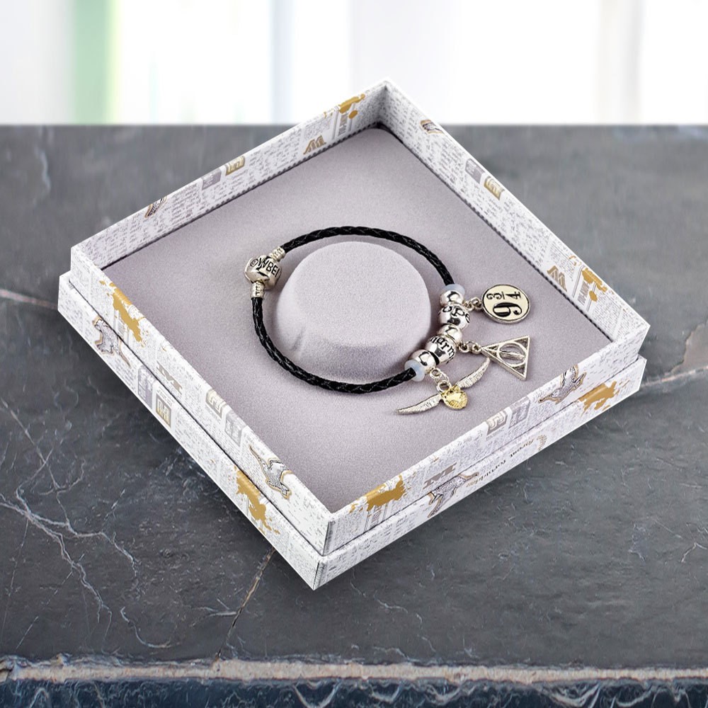 Accessoire Harry Potter bracelet avec 3 pendentifs Poudlard sur Logeekdesign