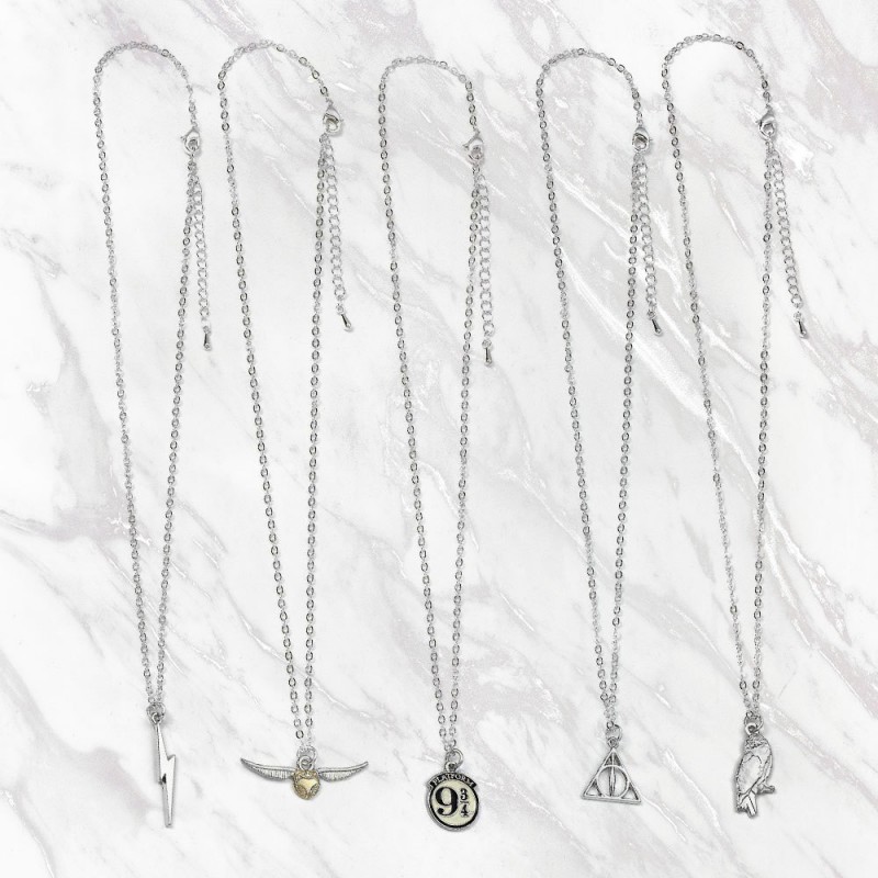 Bijoux Harry Potter : collier et boucles d'oreilles Vif d'Or sur  Logeekdesign