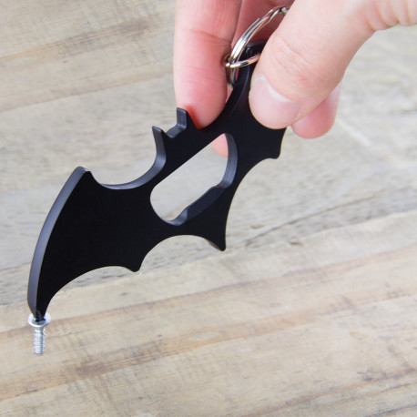 Projectile de Batman servant de décapsulleur